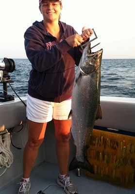 Woman holding a big fish